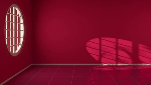 Moderner leerer Raum mit rundem Fenster und roten Wänden