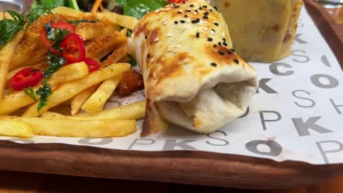 Delicious Wrap Served with Fries and Salad