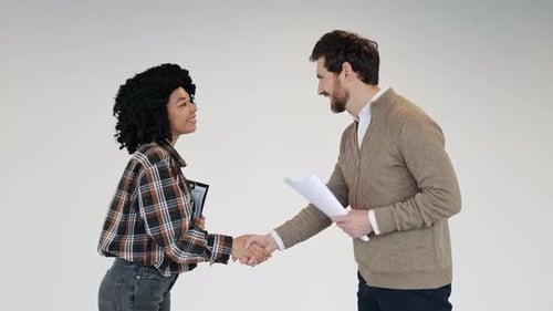Business Partners Shaking Hands in Office Meeting Deal and Success