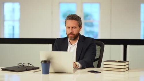 Office Worker with Laptop at Office Ofice Employee Remote Working in Modern Office Businessman Have
