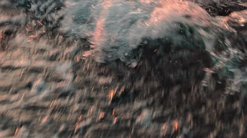 Waves Crashing in Golden Light