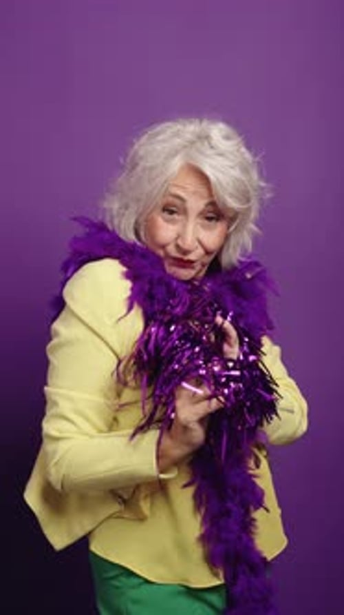 Mature Woman Posing with Purple Accessories on Purple