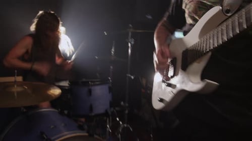 Guitar And Drums In Heavy Metal Rock Band