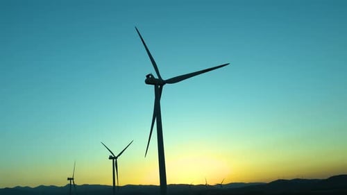 Wind Turbines Turning at Scenic Sunset