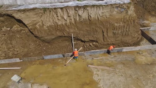 Aerial View Metal Assembly Workers Forming Building Foundation