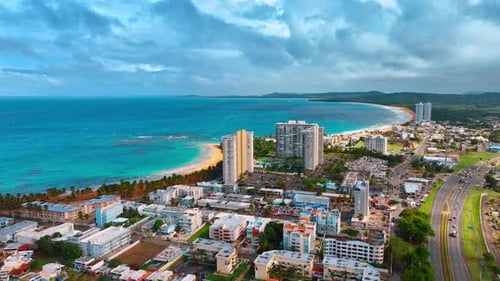 Approaching the picturesque city on the beautiful coast of the turquoise waterscape.
