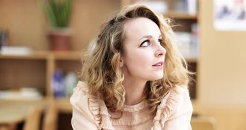 Portrait of young adult female looking to camera