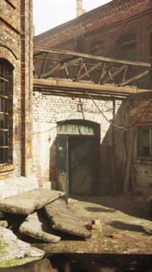 Decrepit Brick Building With Broken Door Vertical