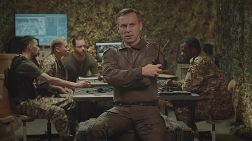 Portrait of Military Control Center Commander with Walkie Talkie