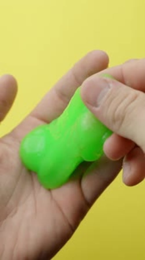 Squeezing Green Slime in Hand