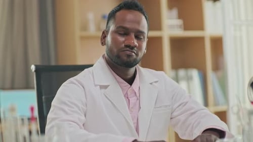 Confident Scientist in Brightly Lit Laboratory Setting