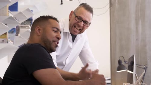 Businessmen discuss teamwork and cooperation during an office meeting in real time