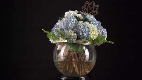 Hydrangea Floral Arrangement with Ribbon in Round Vase