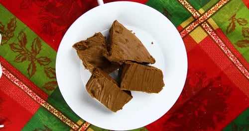 Fudge Brownies rotating on plate