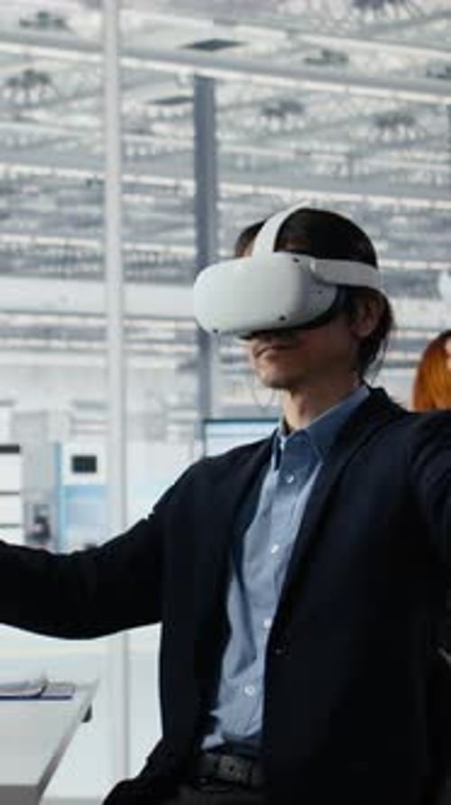 Vertical Video Engineer Using VR Technology to Optimize Microchip Production in Factory