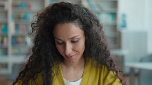 Hispanic Arabian Woman Student Library High School University Writing Copybook Notes Write Exam