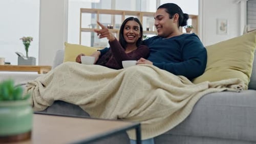 Affectionate Couple Relaxing Together on Sofa