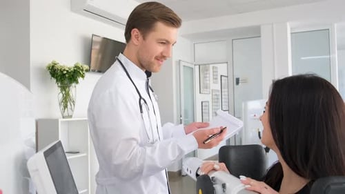 A Doctor in a Rehabilitation Center Prescribes Medication for a Patient