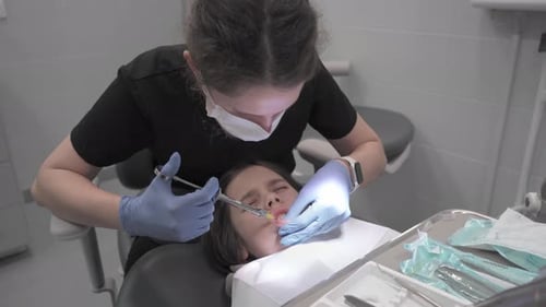 Health Professional Giving Patient Injection in Medical Office