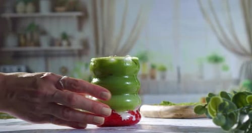 Colorful Green and Red Drink in Kitchen