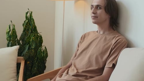 Portrait of Guy Smiling at Camera Indoors