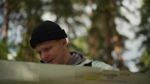 Wilderness Explorer Carefully Studies Chart and Navigation Tools Forest Wanderer Analyzes