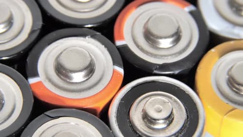 Lots of Old Used Batteries Top View