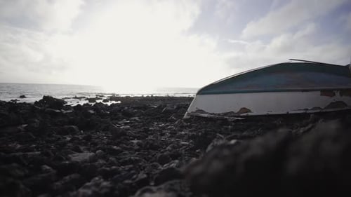 Dumped abandoned fishing motorboat at conservative Fuerteventura Spain