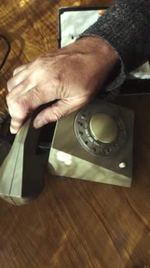 Impatient caller makes pulse dial using rotary dial telephone
