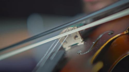Close Up of Violin Being Played With Bow