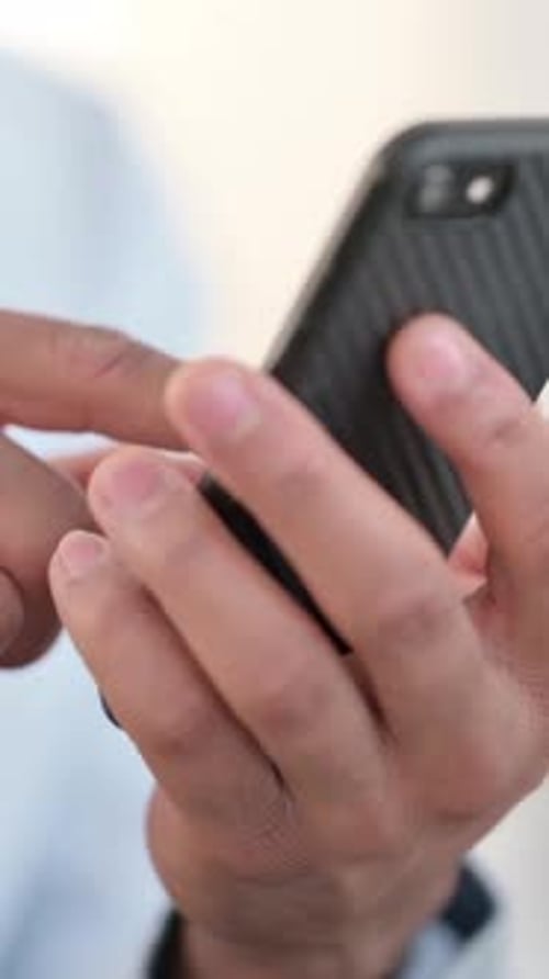 African Man Hands using Smartphone, Close up , vertical video