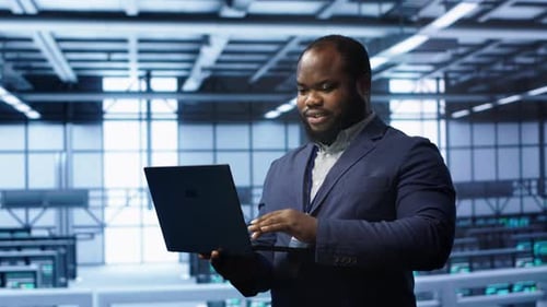 IT Professional in Server Room Looking for Network Issues