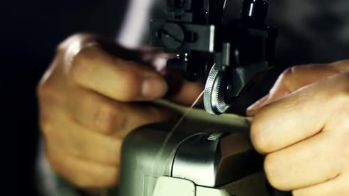 Leather manufacturer starts stitching leather parts with sewing machine in workshop