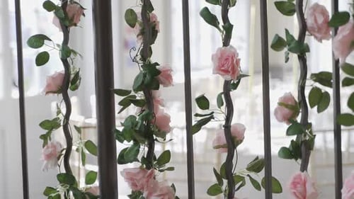 Floral Decorated Staircase with Pink Roses at Wedding