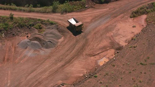 Maui, Hawaii Circa-2018. Aerial View of Dump Truck Driving in Quarry