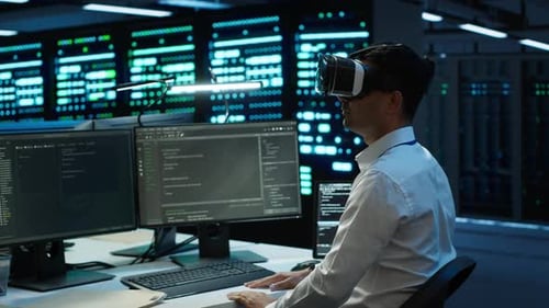 IT Worker Doing Maintenance on Server Farm Gear Using Virtual Reality Technology