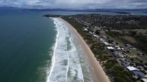 Coastal Serenity Aerial View of a Beautiful Sandy Beach Town