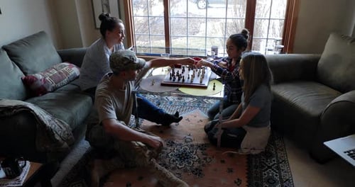Friends gathered to play a game of chess