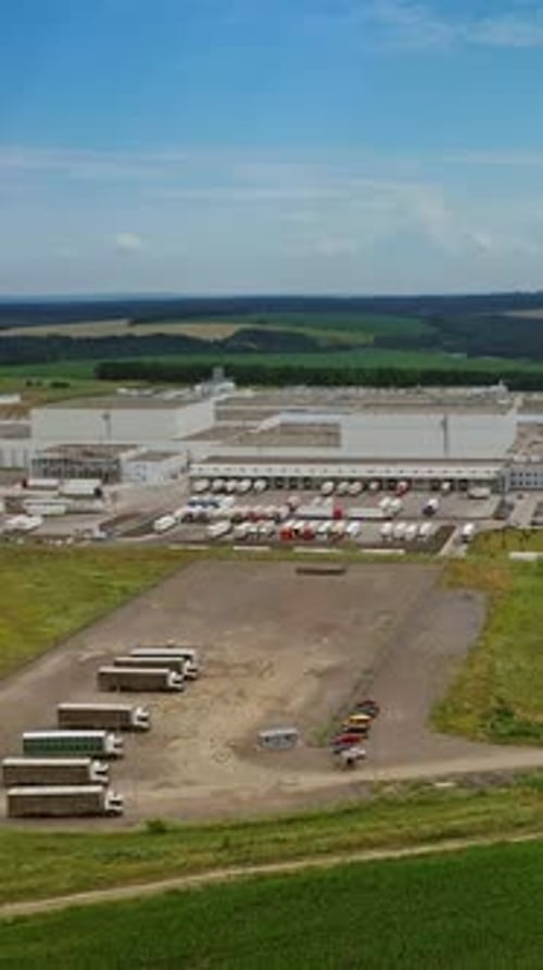 Aerial footage of a large industrial complex. Manufacturing plant. Industrial territory.