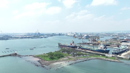 Aerial View Capturing Port Harbor Landscape and Docked Vessels