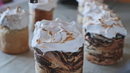 Icing Toasted on Easter Cakes with Small Torch