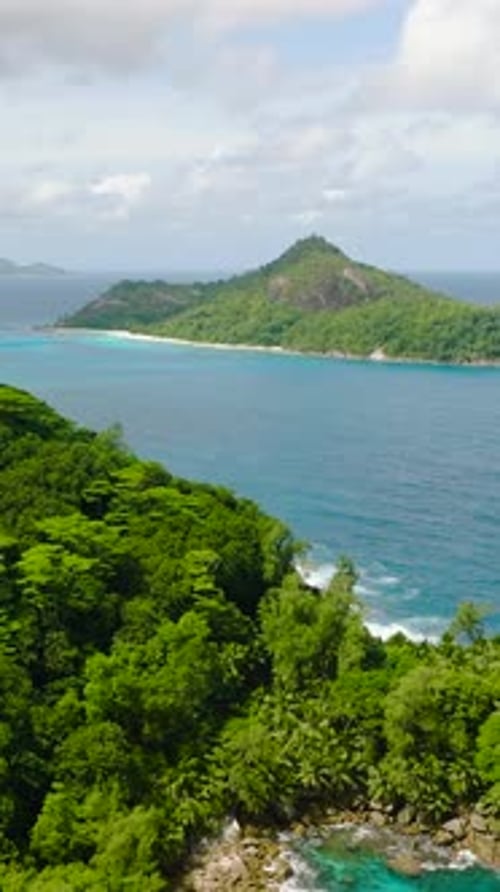 Lush Green Hills Overlooking the Ocean with Distant Islands Seychelles Mahe