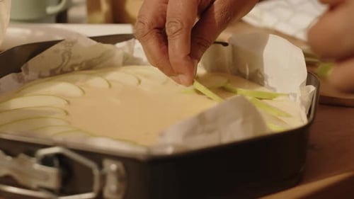 Layering Apples into Homemade Cake Batter