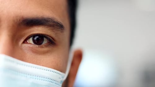 Young worried male protecting himself against disease and illness
