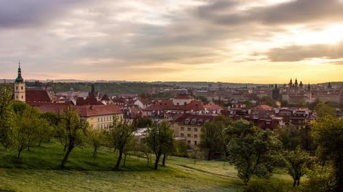 Sunrise timelapse of Prague, Czech Republic as seen from the orchards of Petrin gardens with a view