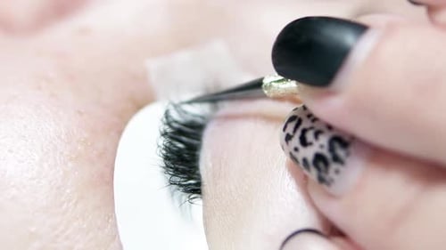 Applying False Eyelashes in Extreme Close Up