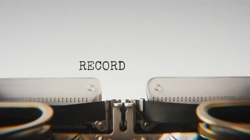 Old mechanical typewriter typing Recording Started in a close-up view.