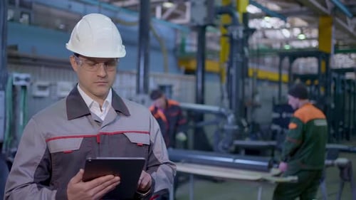 Engineer Man Worker Tablet Heavy Industry Plant Construction Factory Oil Gas Pipeline Manufacture