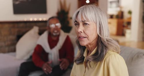 Senior Woman Talking in Living Room
