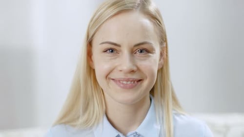 Woman With Blonde Hair Smiling Portrait Close Up
